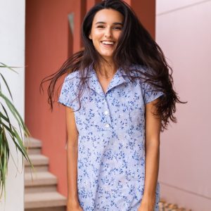 Cheerful Woman in Blue Floral Dress 6